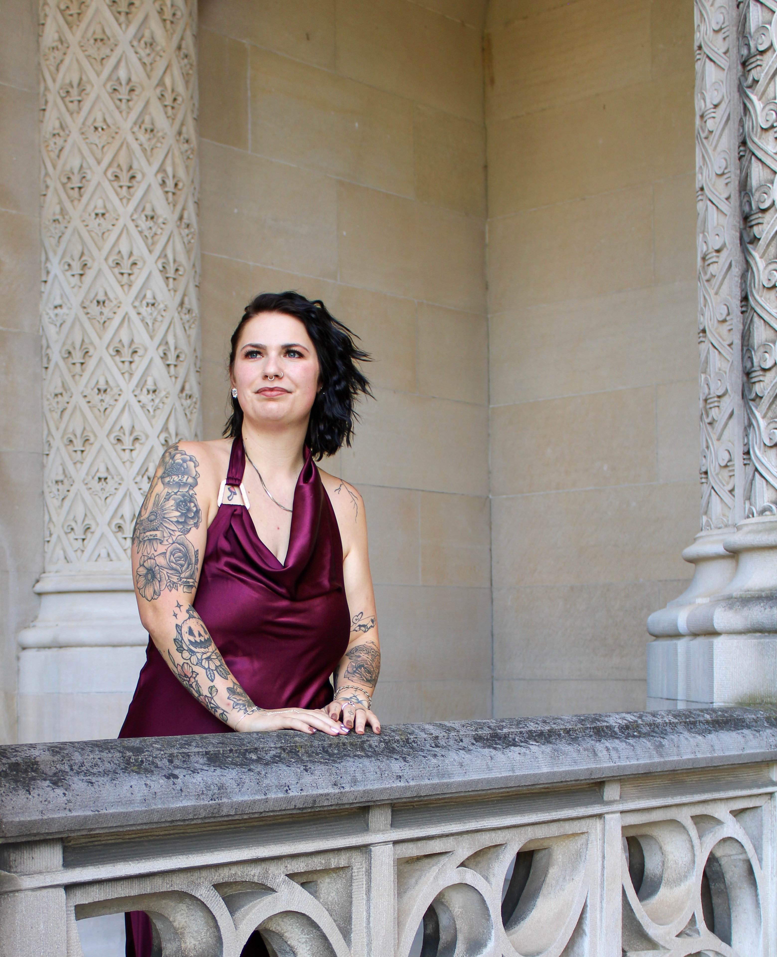 Woman on an ornate balcony, editorial portrait
